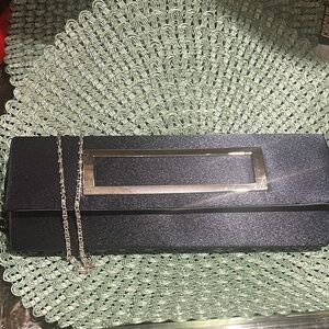 Elegant Blue clutch with Silver Accents. Can be worn with  silver chain